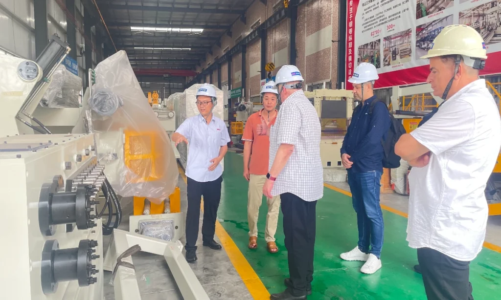 NIKEL delegation inspecting XIONGJIN flying shear line 3