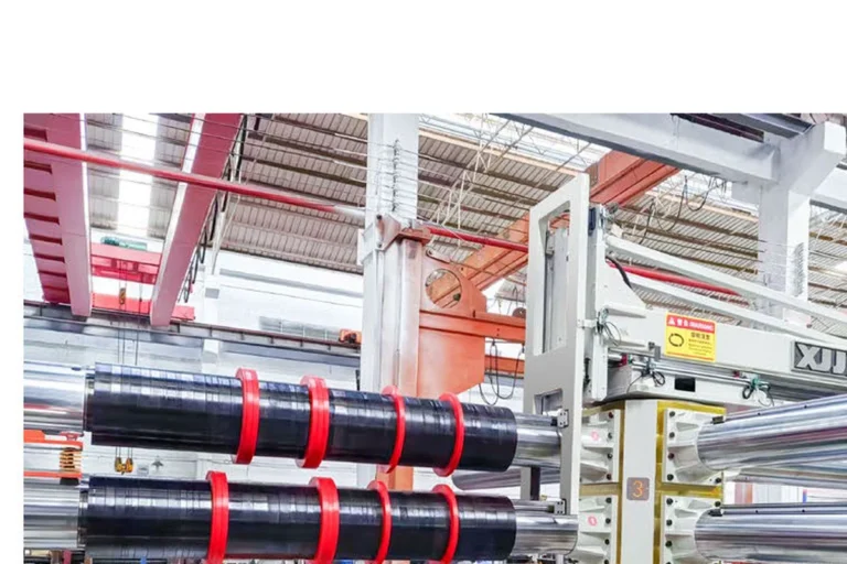 Cross-type blade changer arm installed on a precision steel coil slitting line
