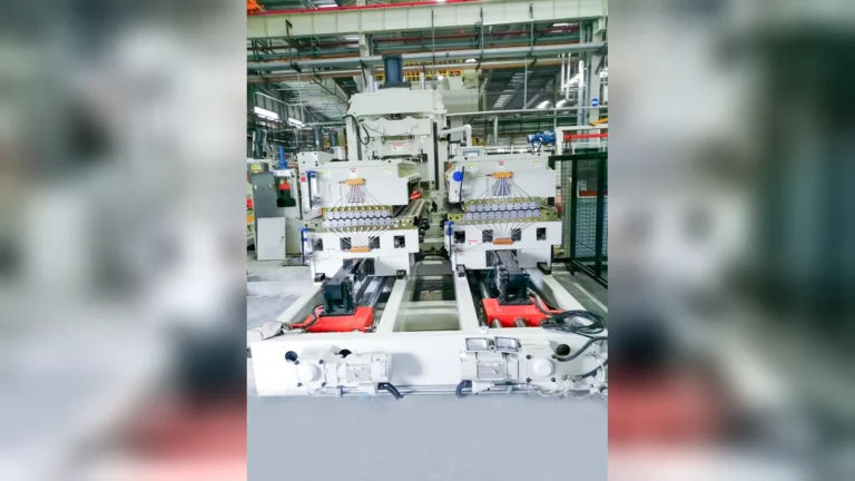 Drawer-type roller changing units positioned on guided rails.